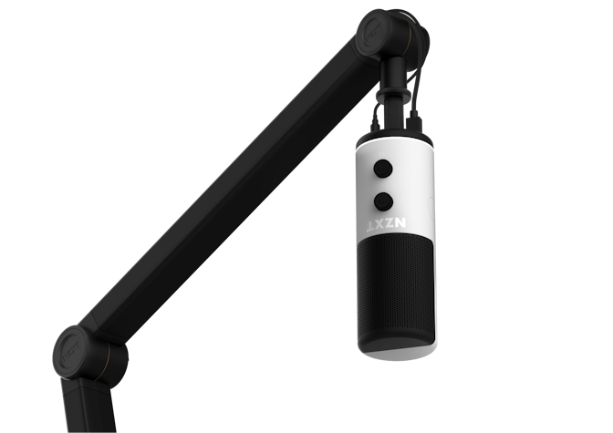 White Capsule microphone attached to boom
