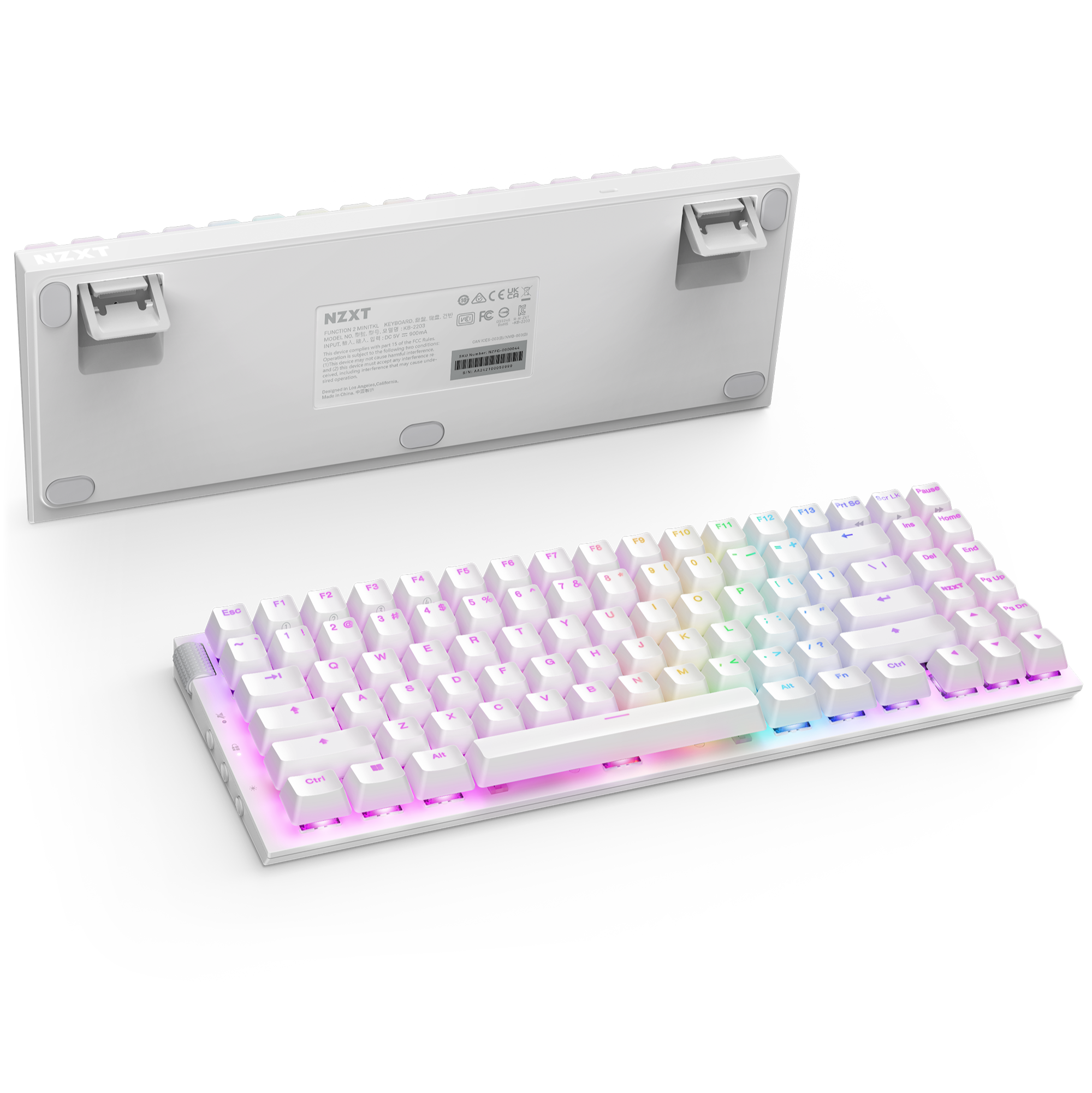 The NZXT Function 2 MiniTKL is a white compact mechanical keyboard with RGB backlighting. Front and back views show flip-out stands and product info stickers. It features smooth linear optical switches for seamless typing.