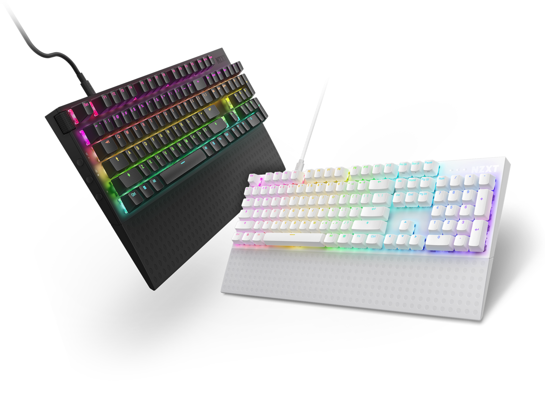Two mechanical keyboards, one black and one white, both with RGB backlighting displaying rainbow colors. The keyboards are angled diagonally on a black background.