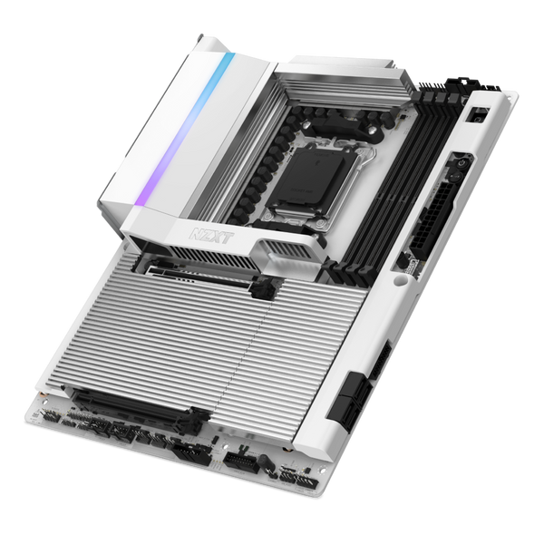 The NZXT N9 X870E motherboard features a modern white design with large silver heatsinks, black DDR5 RAM slots, and stylish RGB lighting accents.